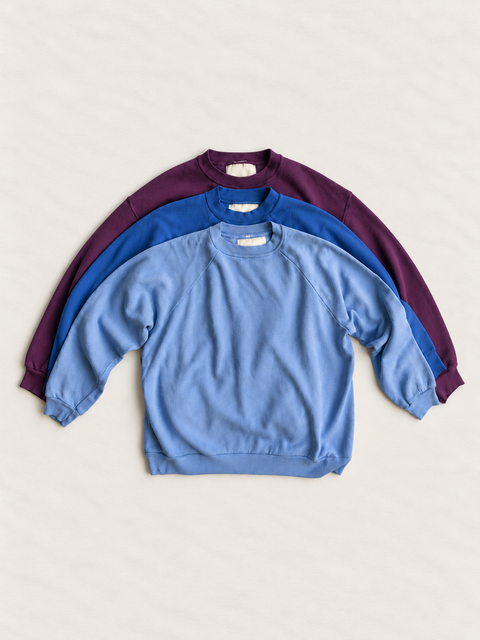 Blue Haze Bleached Down 3-pack, full crewneck group with sleeves and cuffs visible; colors vary by pack