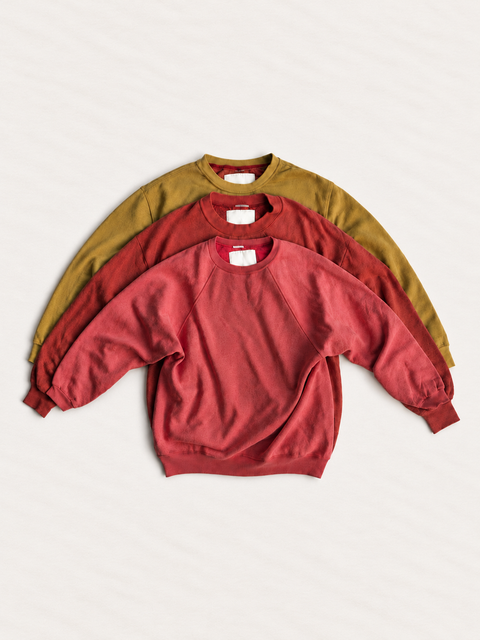 Sunspill Bleached Down 3-pack, full crewneck group with sleeves and cuffs visible; colors vary by pack